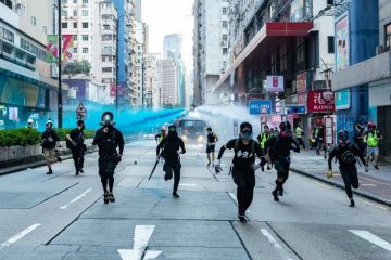 KENJI WONG - In front of the water cannon- Hong Kong People